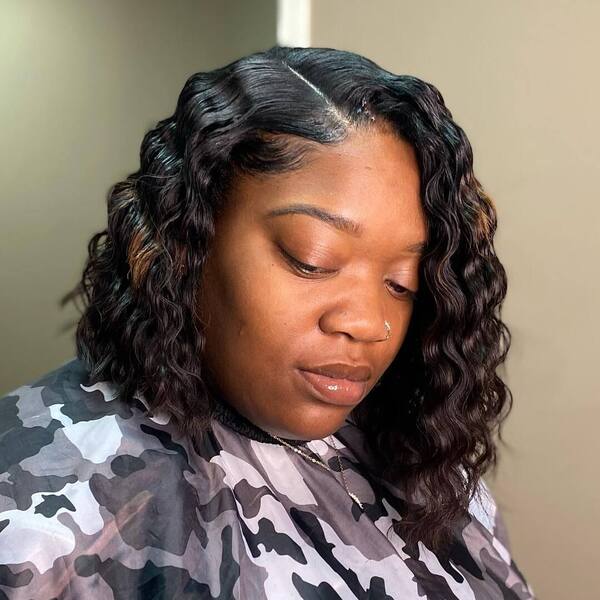 Crimped Hair for Bob Cut Style - a woman wearing a camouflage cape