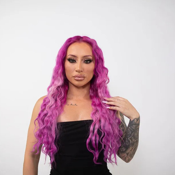 Crimped Hair with Mermaid Pink Color - a woman wearing a dress