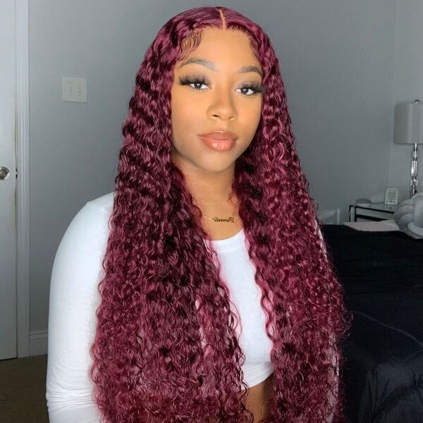 Curl Violet Red Burgundy Hairstyle - a woman in a portrait