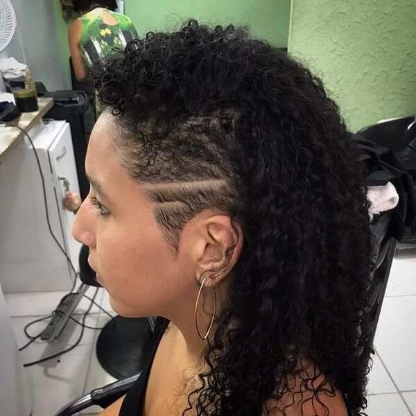 Curly Hair and Side Cut Style - a woman in a side view