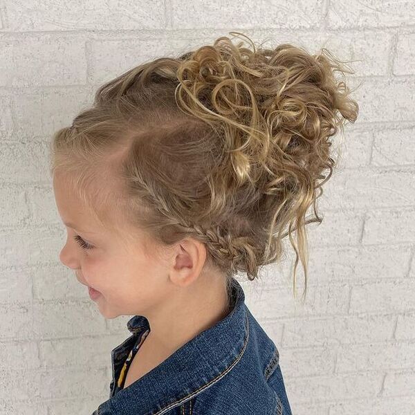 Curly Updo Braid Style- A girl wearing denim jacket