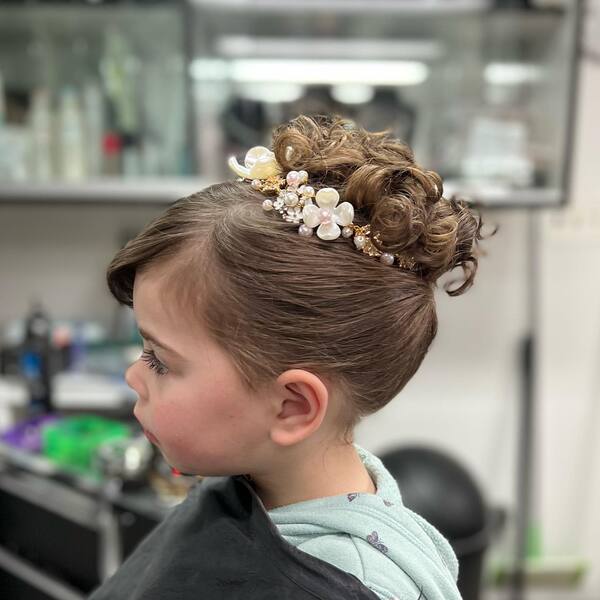 Curly Updo with Oceans Pearls and Flowers - a girl in a side view