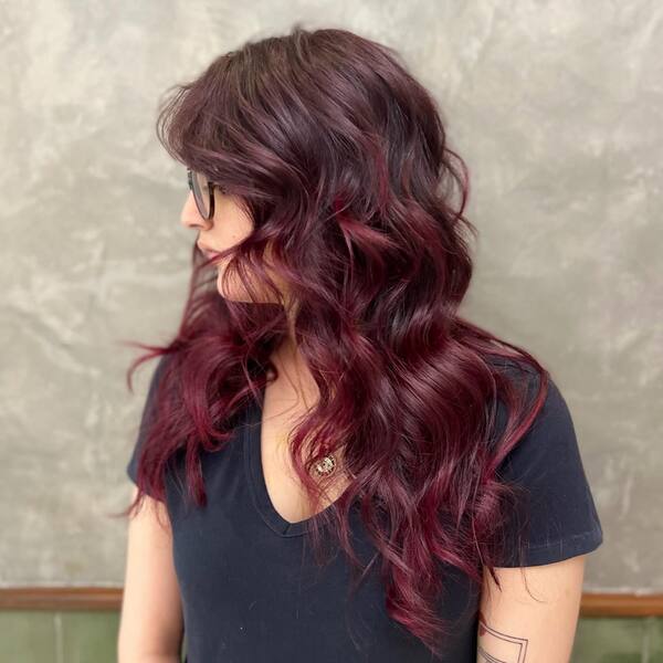 Deep Waves and Dark Wine Burgundy - a woman in a side view