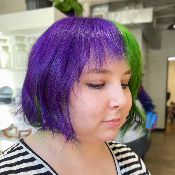 Double Tone Short Hair with Slight Wispy Bangs - a woman in a side view