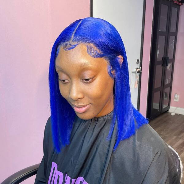 Electric Blue for Long Bob with Finger Waves -a woman wearing a black cape