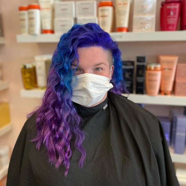 Galactic Crimped Hair - a woman wearing a face mask