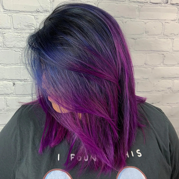 Galactic Purple and Black Hairstyle - a woman in a side view