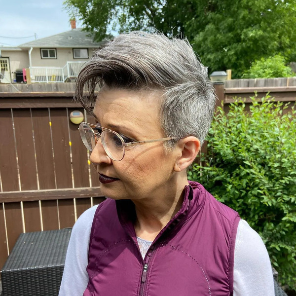 Silver Gray Pixie Haircuts for Older Women in a Funky Style  - a woman wearing an eyeglasses