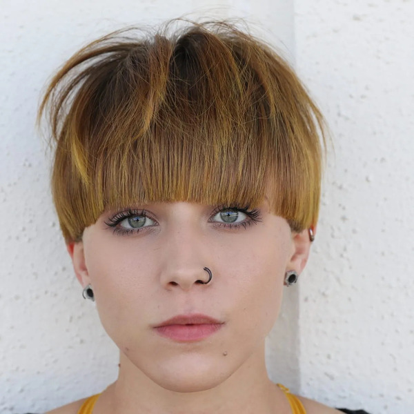 Husk Style for Mushroom Haircut - a woman in a portrait