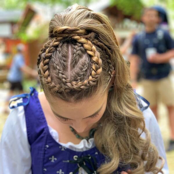 Intricate Cornrows Hairstyle - a woman wearing a dress