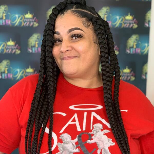 Jumbo Lemonade Braids - a woman wearing a red a shirt