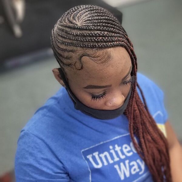 Lemonade Braids and Copper Tones - a woman wearing a blue shirt