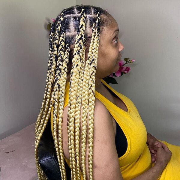 Lemonade Braids in Blonde Tone - a woman in a side view