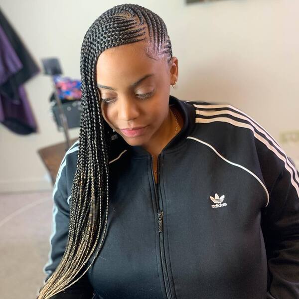 Long Adjacent Lemonade Braids - a woman wearing a jacket