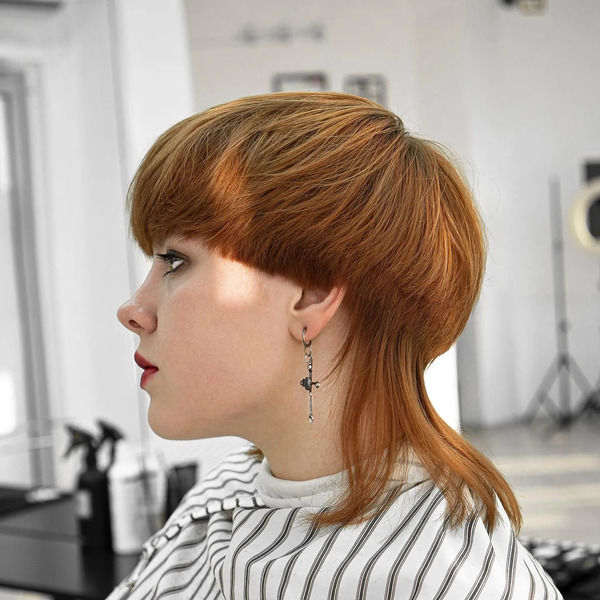 Long Hair Mullet for Mushroom Cut - a woman in wearing a barber's cape