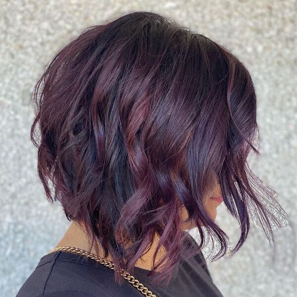 Merlot Wine Color in Textured Hair -a woman in a side view