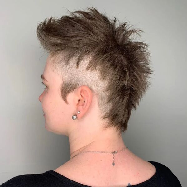 Mohawk and Undercut with Small Side Burn - a woman in a side view