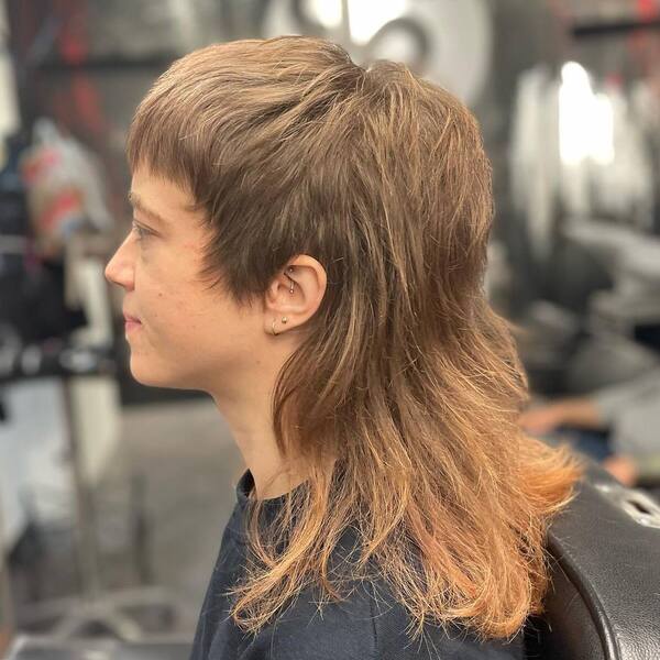 Mullet Haircut - a woman in a side view