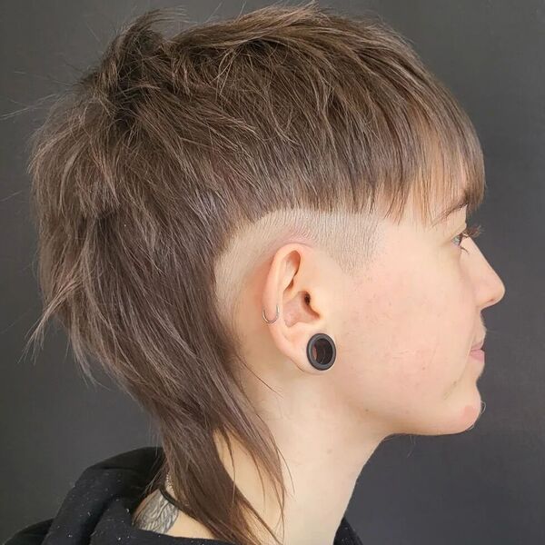 Mullet with Undercut - a woman in a side view