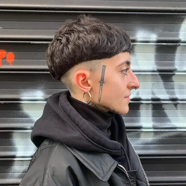 Mushroom Cut for Deep Wavy Hair - a woman wearing leathered jacket