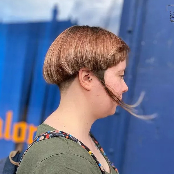 Mushroom Cut with Long Tendrils - a woman in a side view