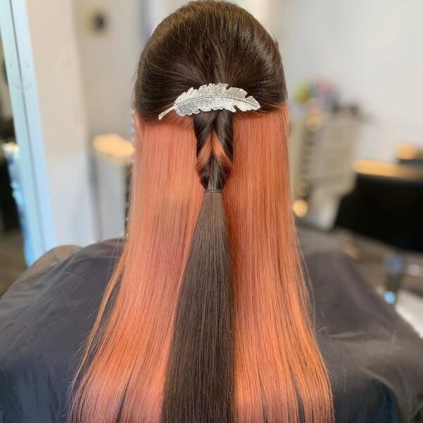 Peachy Peek-a-Boo with styled Pony Tail -a woman in a back view