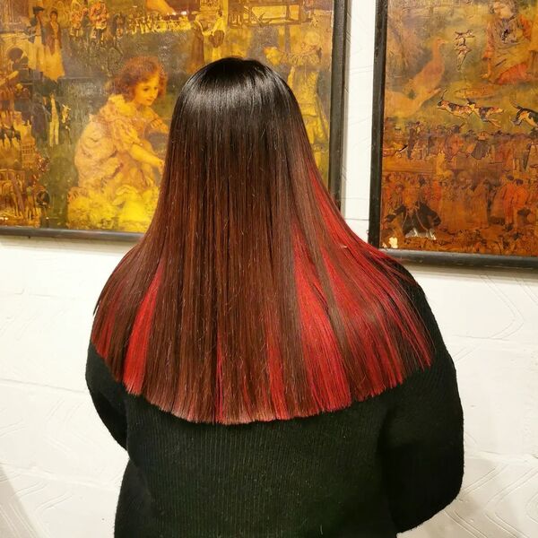 Peek-a-Boo Red Hair Color - a woman in a back view