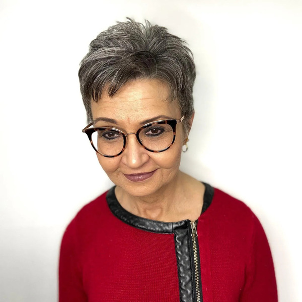 Pixie Haircuts for Older Women with Silver Fox Hairstyle - a woman wearing an eyeglasses