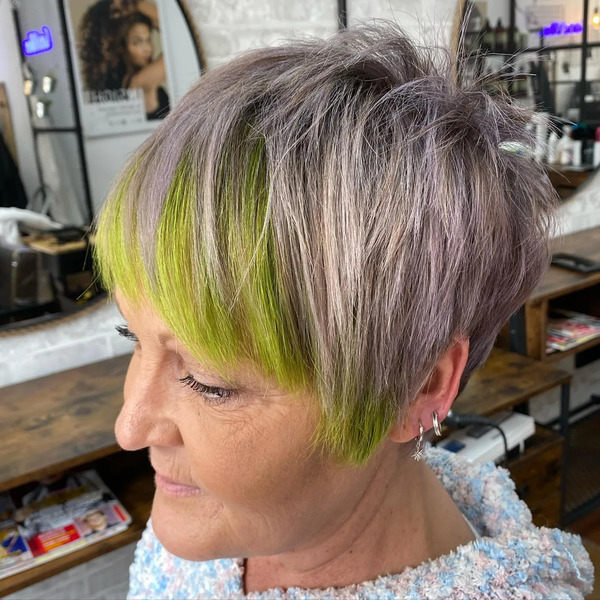 Pixie Haircuts for Older Women with Pistachio Green Peek-A-Boo - a woman in a side a view