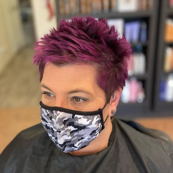 Pixie Funky Hair with Purple Tone - a woman wearing a face mask