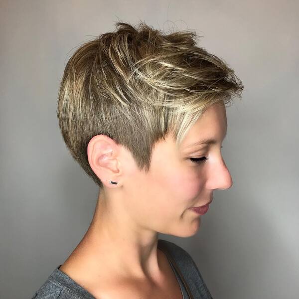 Pixie Hair with Blonde Highlights - a woman in a side view