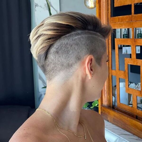 Pixie Undercut with Shaved Lines - a woman in a side view