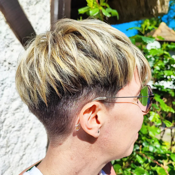 Pixie Haircuts for Older Women with Undercut - a woman in a side view