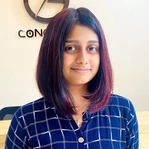 Red Velvet Highlight for Bob Haircut - a woman wearing a checkered polo