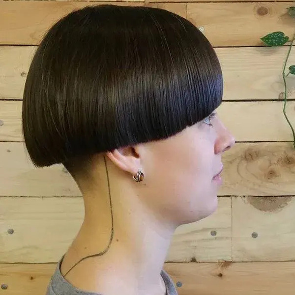 Retro Shaved Bowl Cut - a woman in a side view