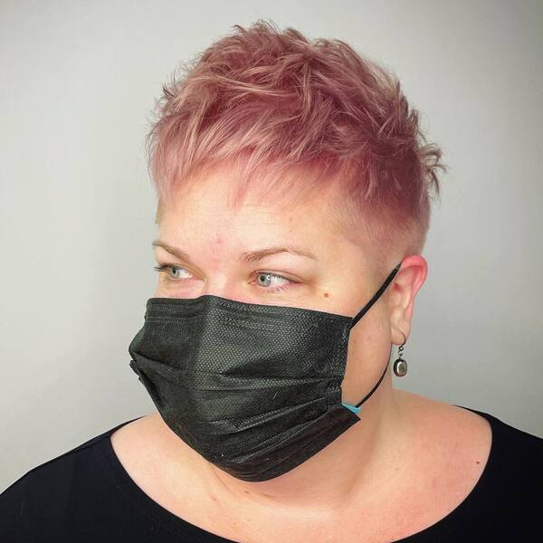 Rose Quartz Pixie Hair - a woman wearing a black face mask