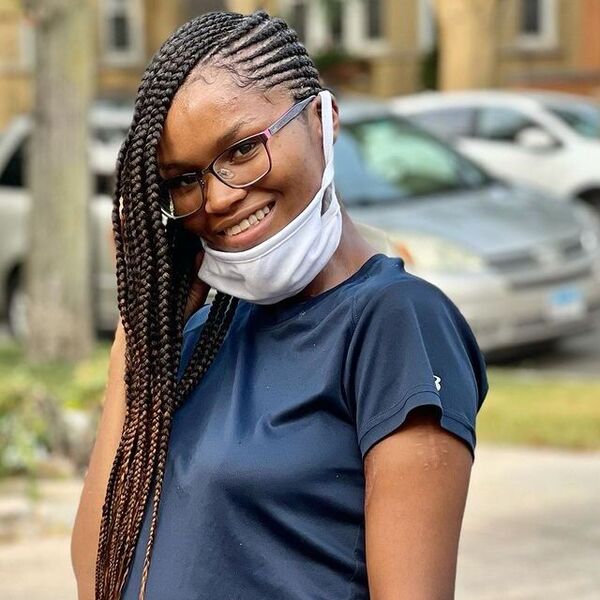 Simple Twist Lemonade Braids - a woman wearing a white face mask