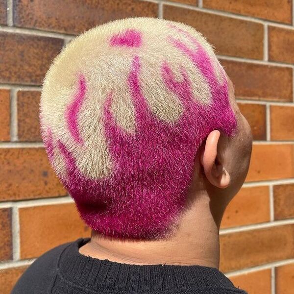 Shaved Head and Pink Flames Haircut - a woman in a back view