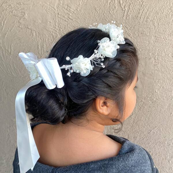 Side Braid Updo and White Flower Crown - a girl in a back view