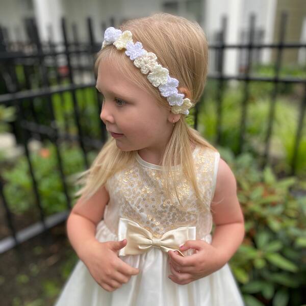 Simple Blonde Hair Dainty Flower Crowns - a girl wearing a dress