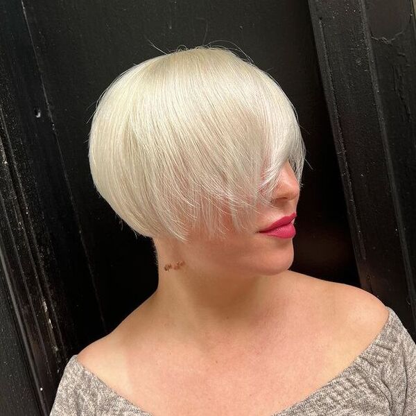 Super-Short Blunt Bob with Lengthy Bangs - a woman in a side view