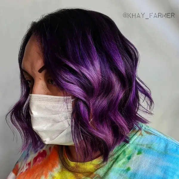 Striped Black and Purple for Textured Bob - a woman wearing a face mask