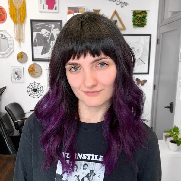 Textured Fringe with Deep Purple and Black Hair - a woman wearing a black shirt