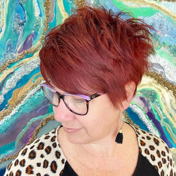 Textured Pixie Cut and Rocking Red Color - a woman in a side view