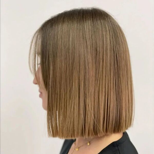 The Shoulder Length Bob Cut - a woman in a side view