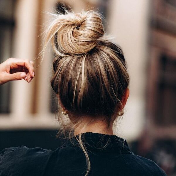 The Typical Bun Hairstyle - a woman in a back view