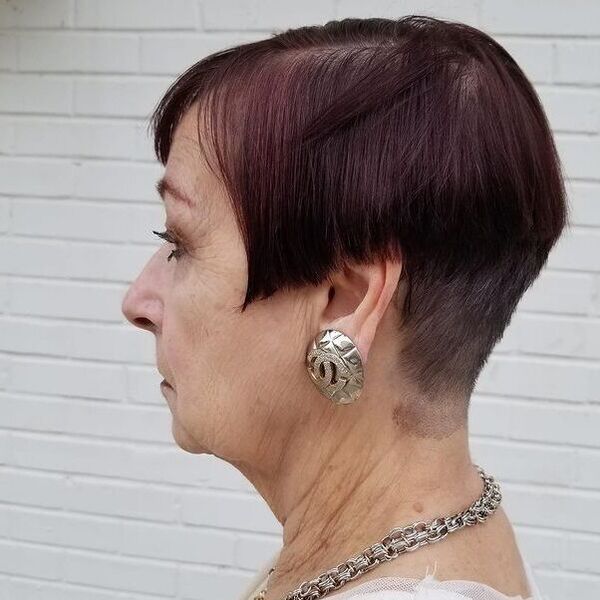 Undercut French Bob and Deep Burgundy for Older Women - a woman in a side view