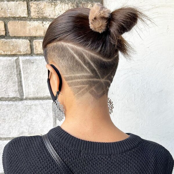 Undercut with Geometric Shaved Lines - a woman in a back view