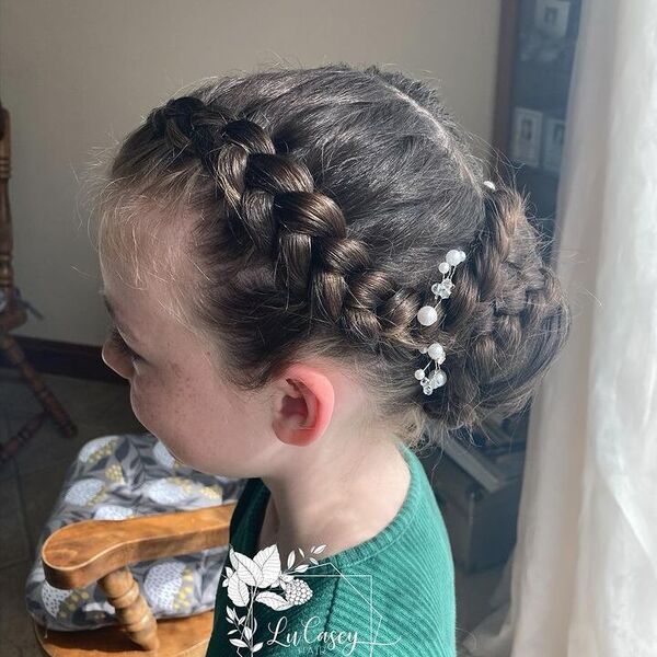 Updo Double Dutch Braid - a girl wearing a green blouse