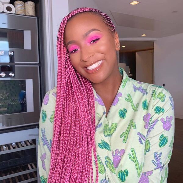 Vibrant in Pink Lemonade Braids - a woman wearing a dress